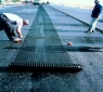 Ремонт на рефлекторни пукнатини чрез армиране на новото асфалтово покритие